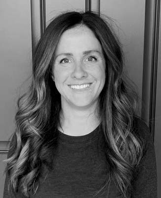 Headshot of Gelsey Klein smiling in black and white