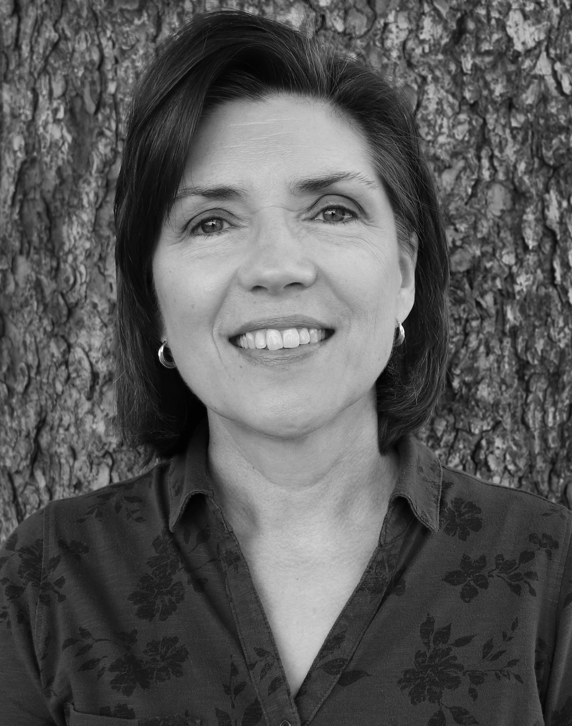 Headshot of Nan McRoberts smiling in black and white
